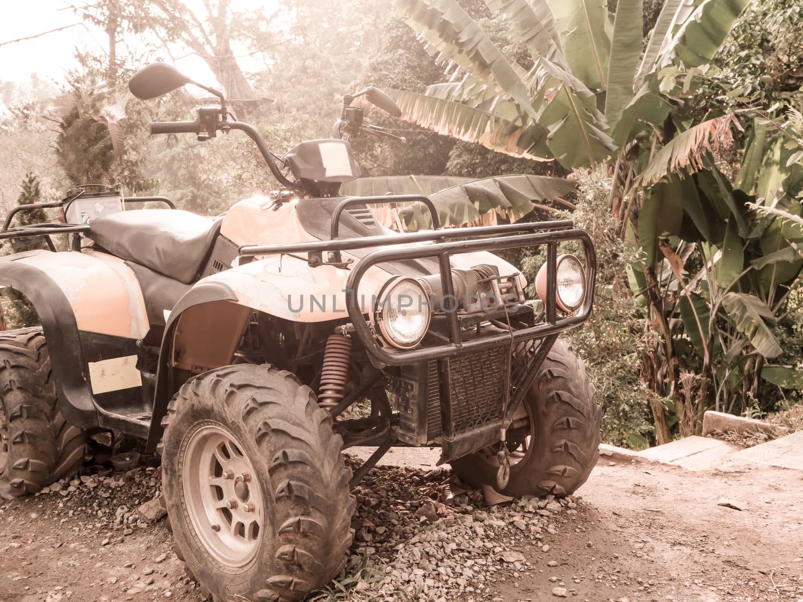 Atv on the evening mountains