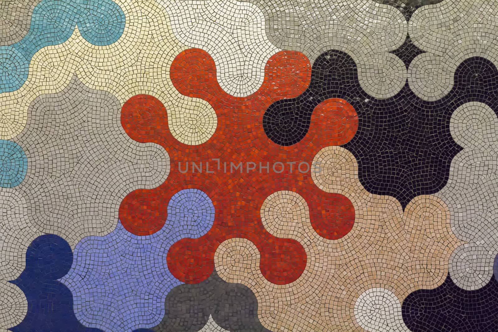 Modern ceramic mosaic in puzzle shapes with many colors