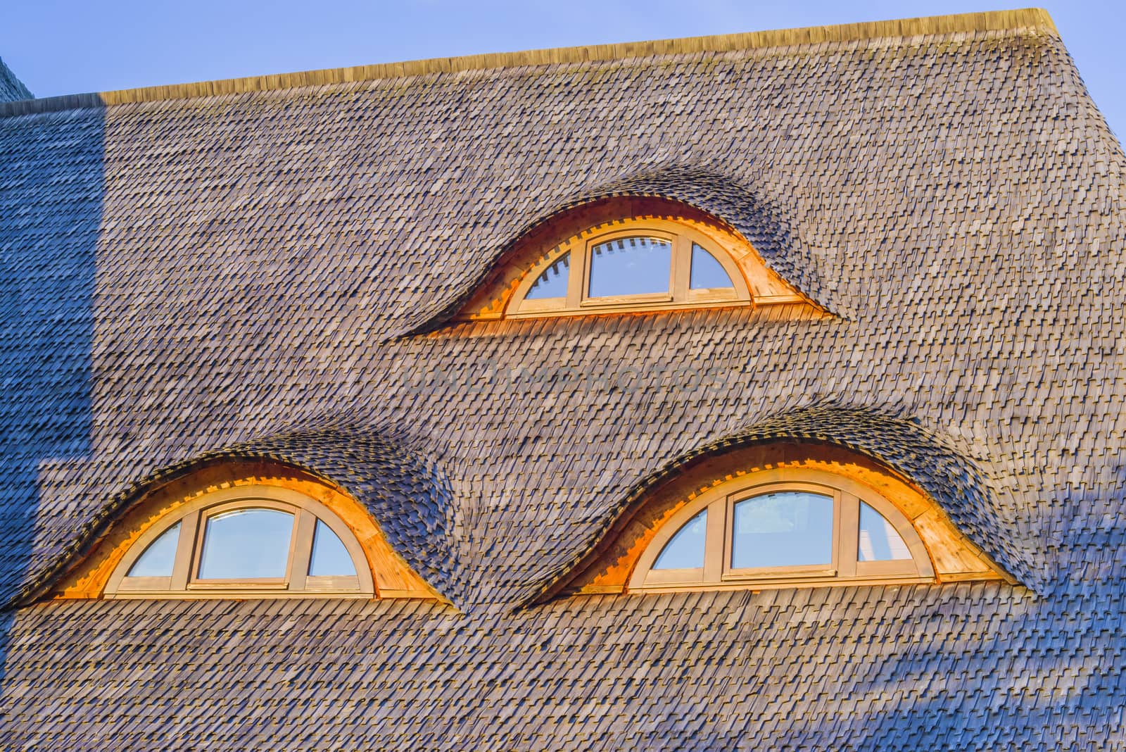 Roof window in a traditional  romanianwooden house from Maramures, northern Romania