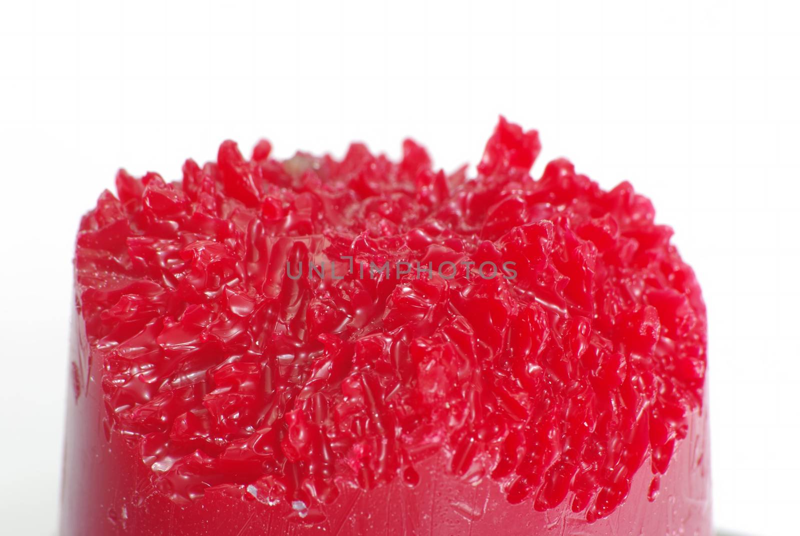 Close image of red wax used in dentistry laborator