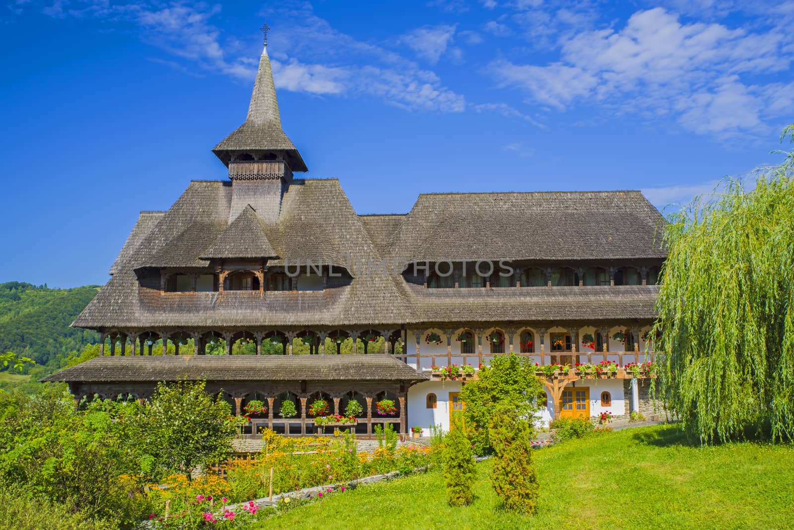 Barsana monastery house in the middle of nature. Barsana monastery is an important landmark in Maramures area (Romania)
