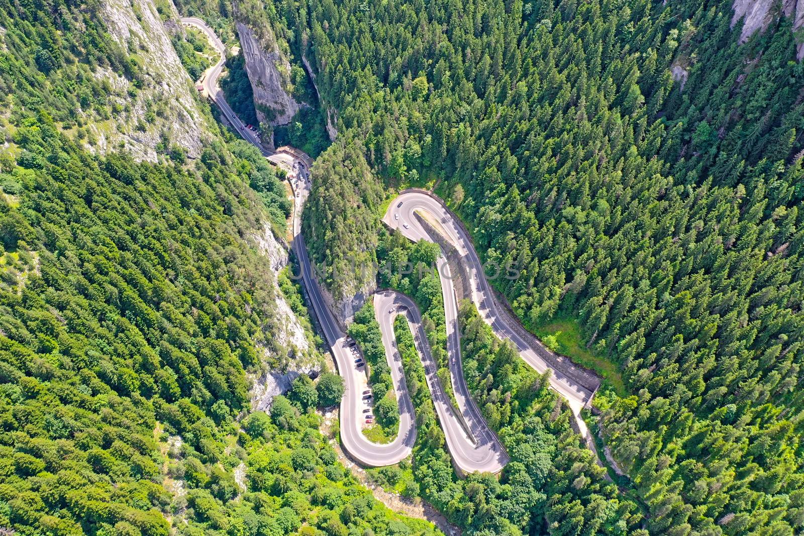 Rocky mountain and winding road, above view Bicaz Gorges in Romanian Carpathians.