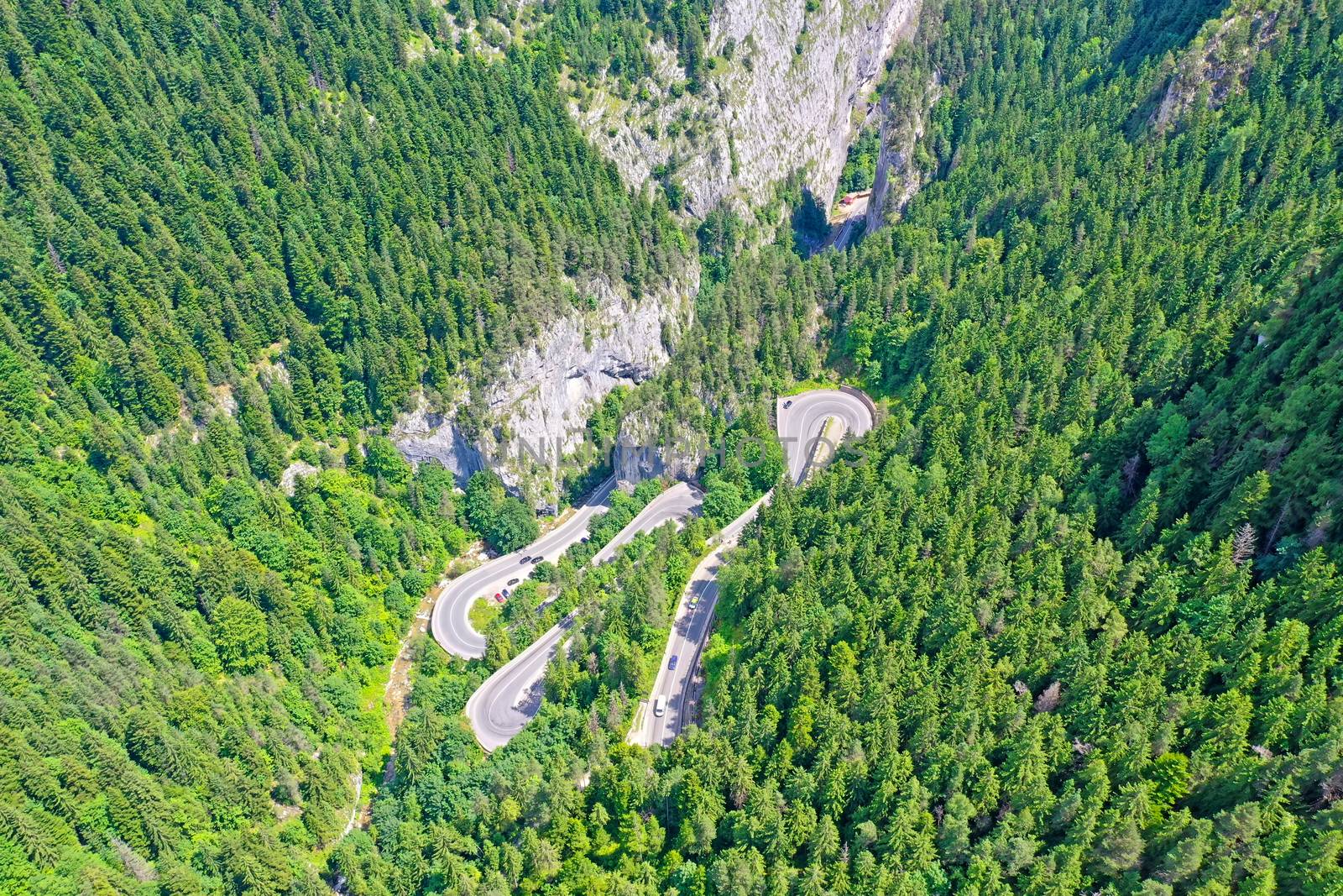 Rocky mountain and winding road, above view Bicaz Gorges in Romanian Carpathians.