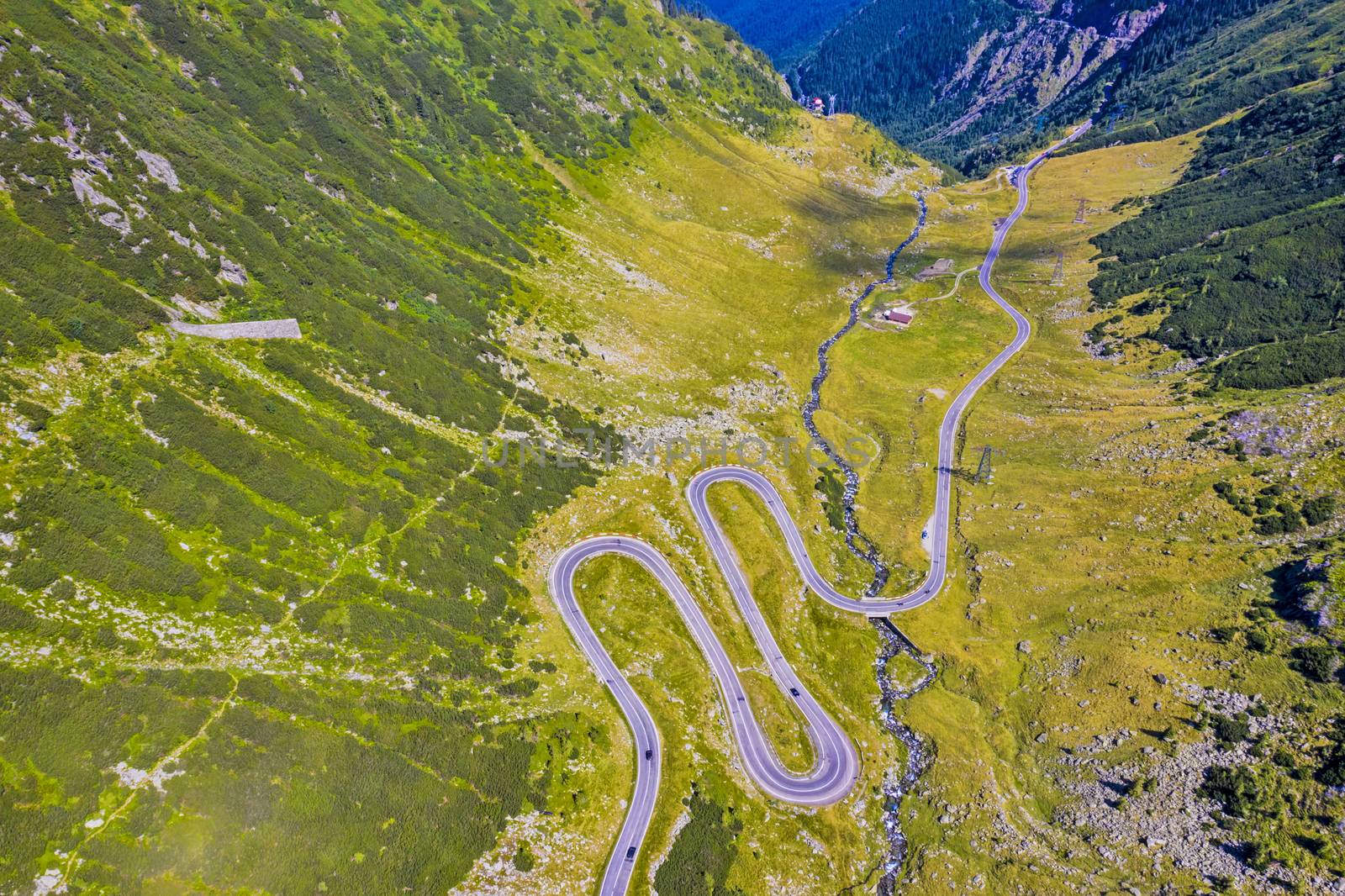 Above view of curvy road in Romanian Carpathians, summer view, Transfagarasan road in Romania