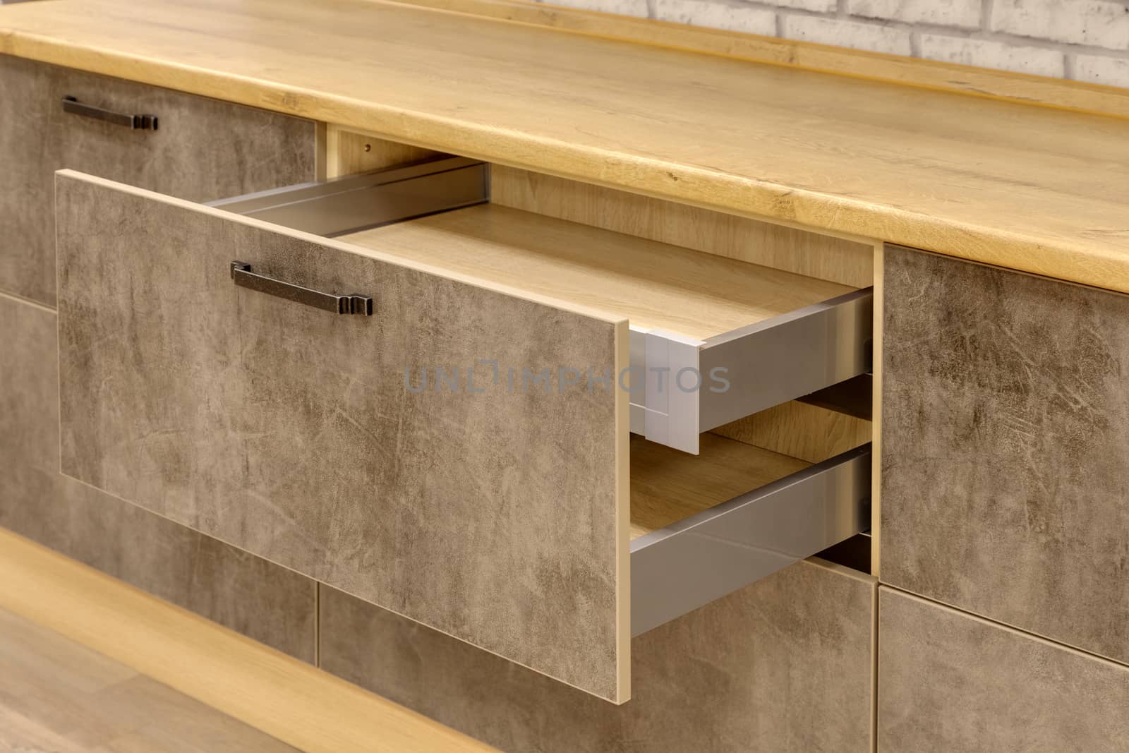 a kitchen interior with drawers by sveter