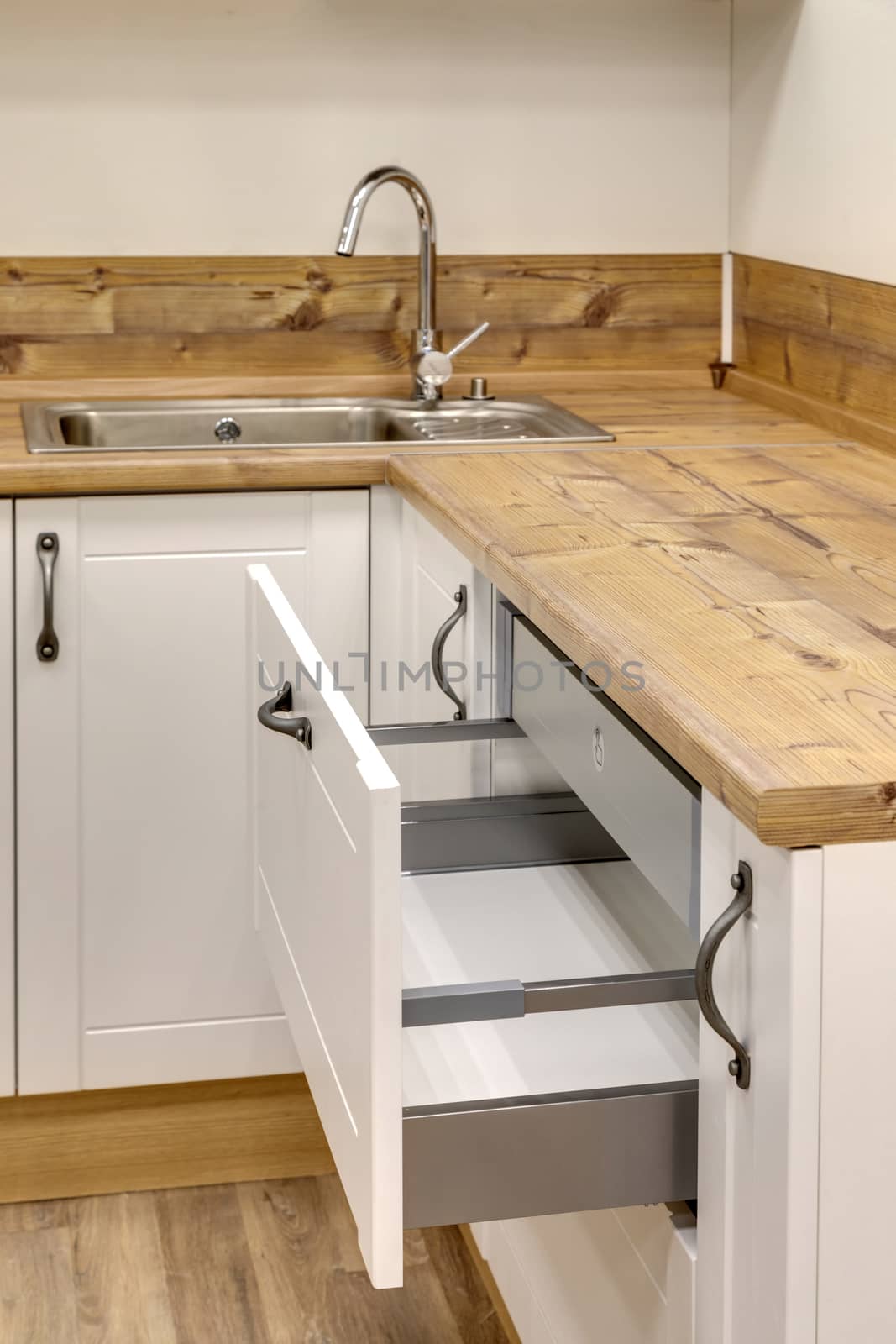 Fragment of a kitchen interior with drawers