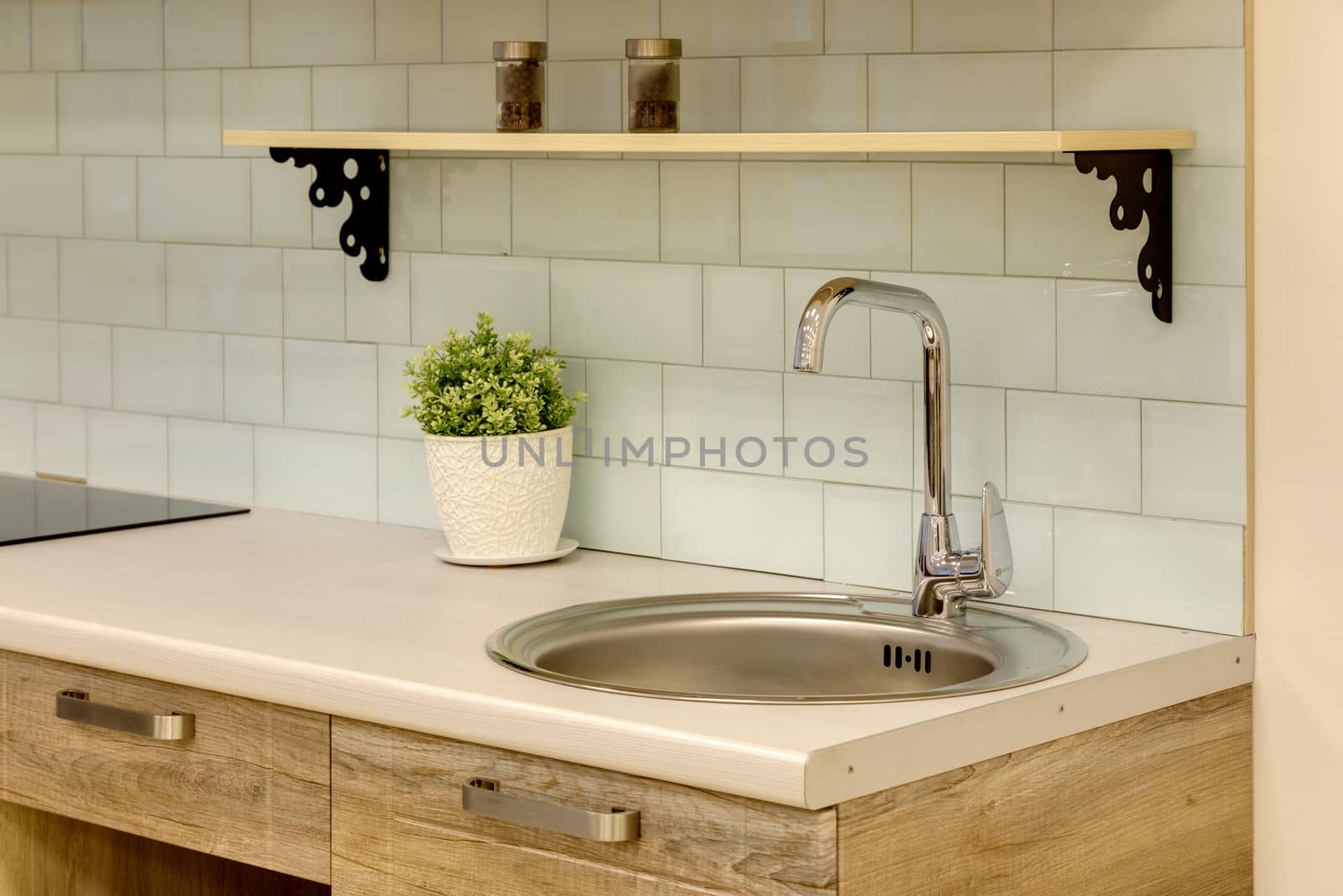 a kitchen interior with drawers by sveter