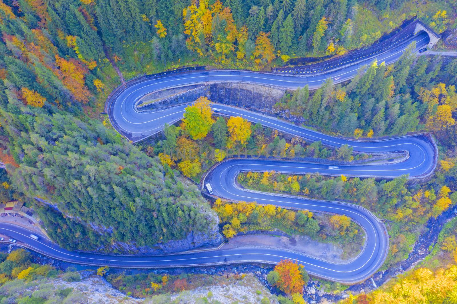 Rocky mountain curvy road in Romanian Carpathians. Bicaz Gorges are a mountain pass between two historic region in Romania.