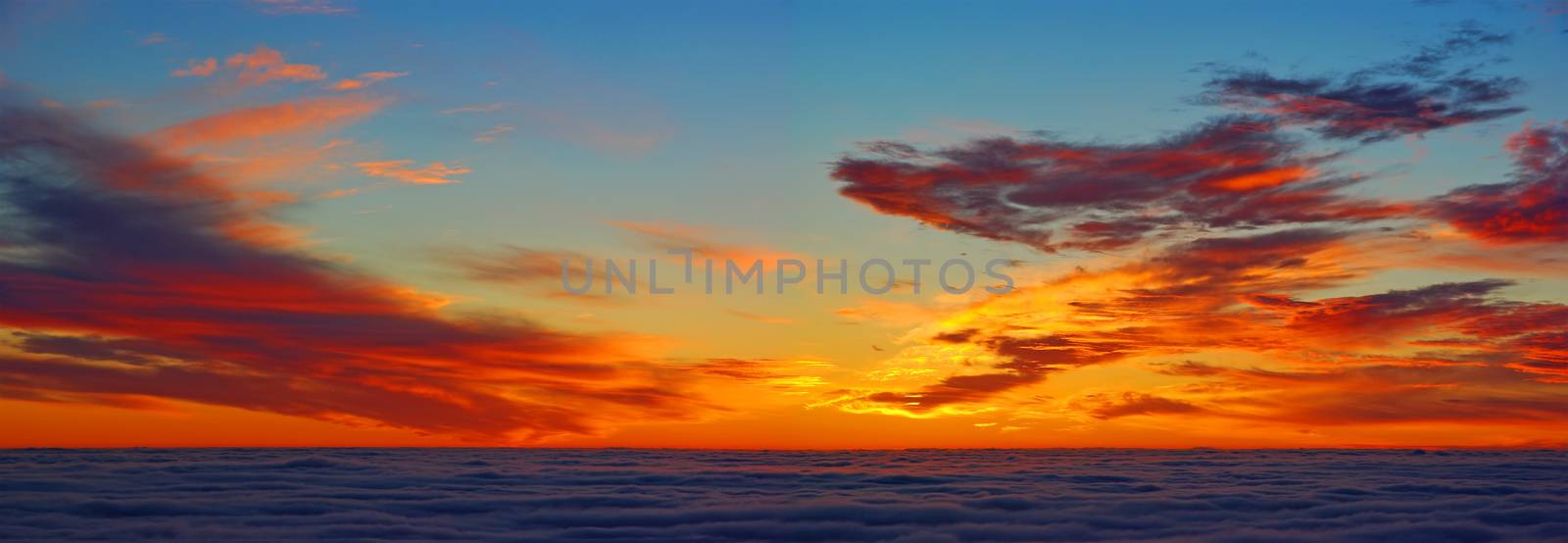 Sunrise panorama above clouds, Orange clouds in the morning, before sunrise