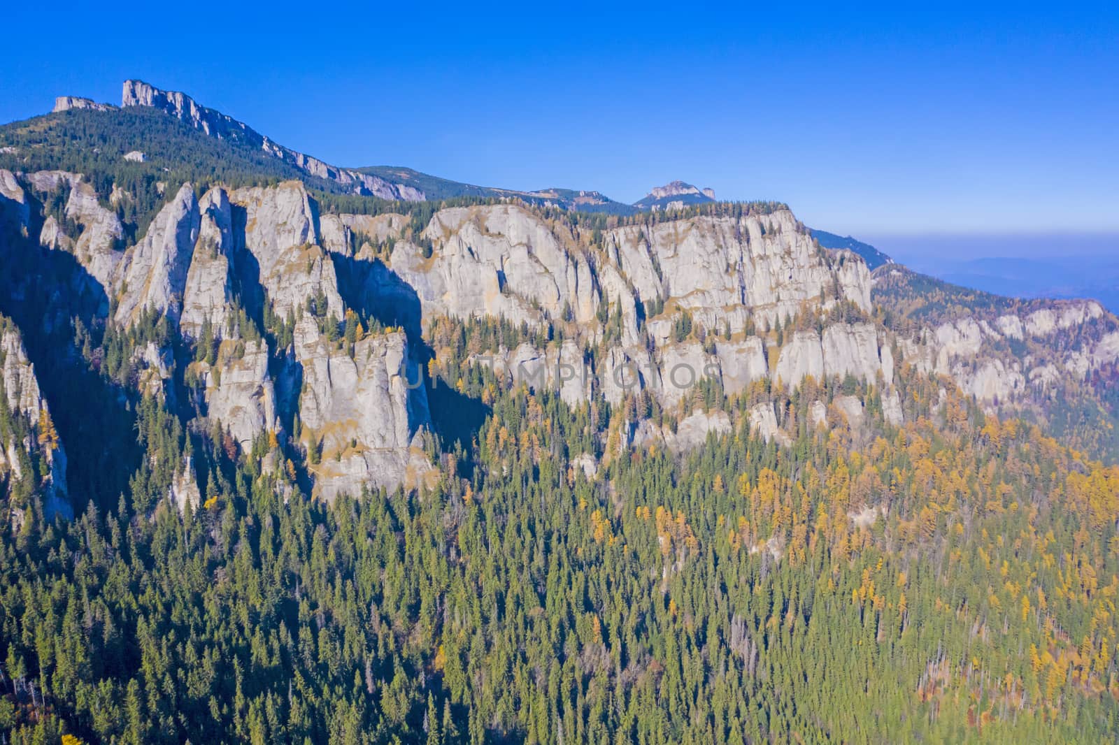 Aerial view of mountain rock wall by savcoco