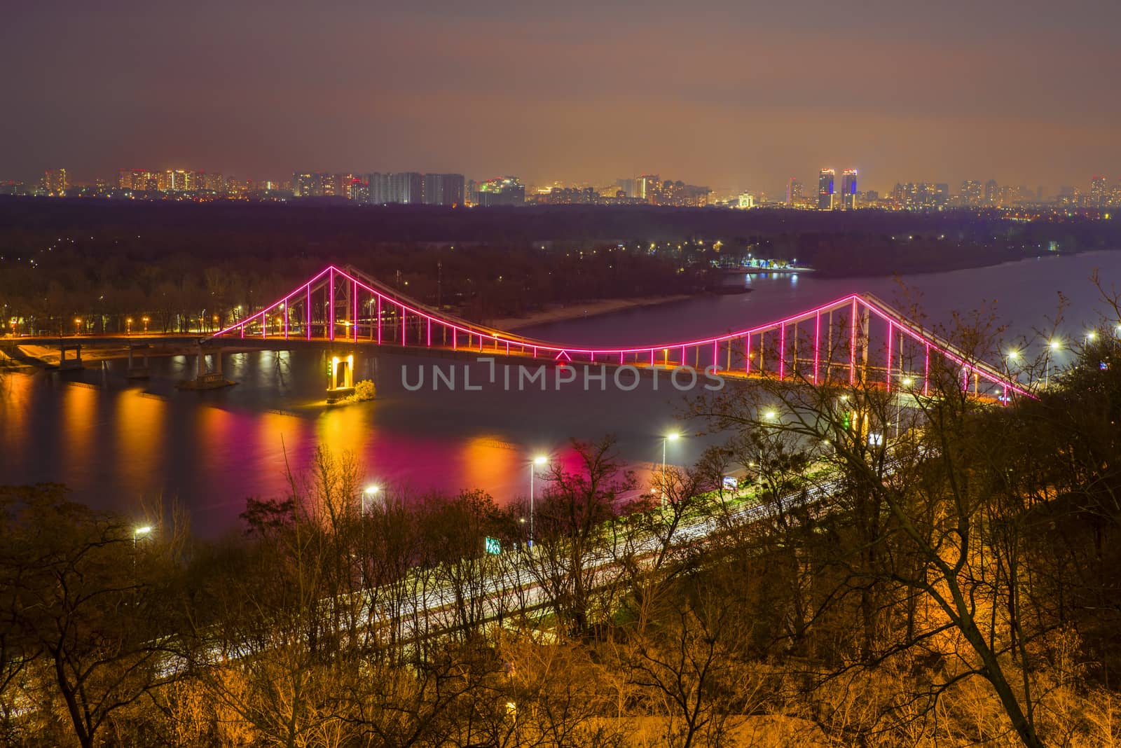Night landscape of Patona Bridge over Dnieper River in Kiev