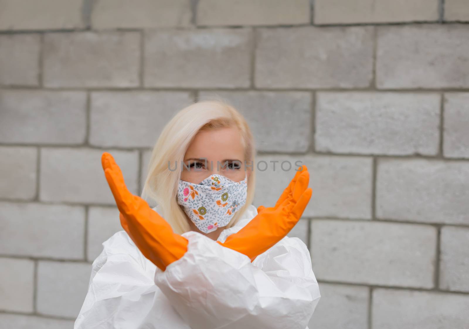 Woman in black mask, white protective suit and gloves by Angel_a