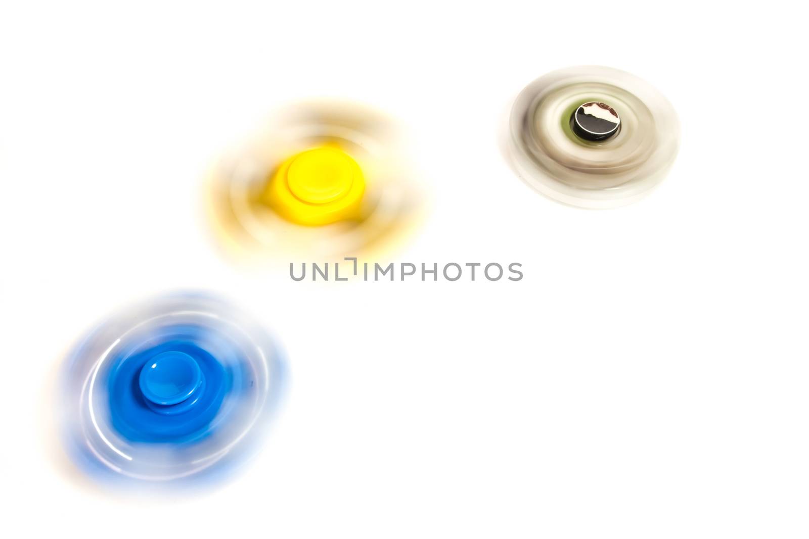 fidget hand spinner spinning on white background