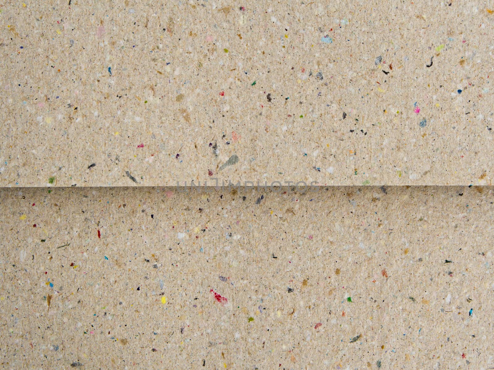 Texture of recycle cardboard paper / brown colored background