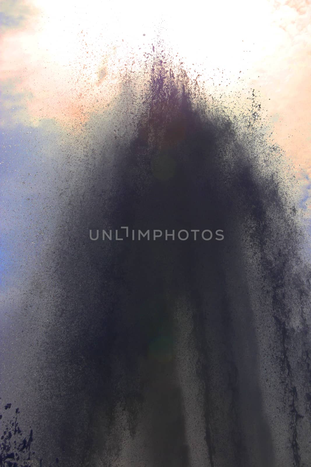 A large amount of water from the fountains rises to the sky. Wet spray waterfall background.