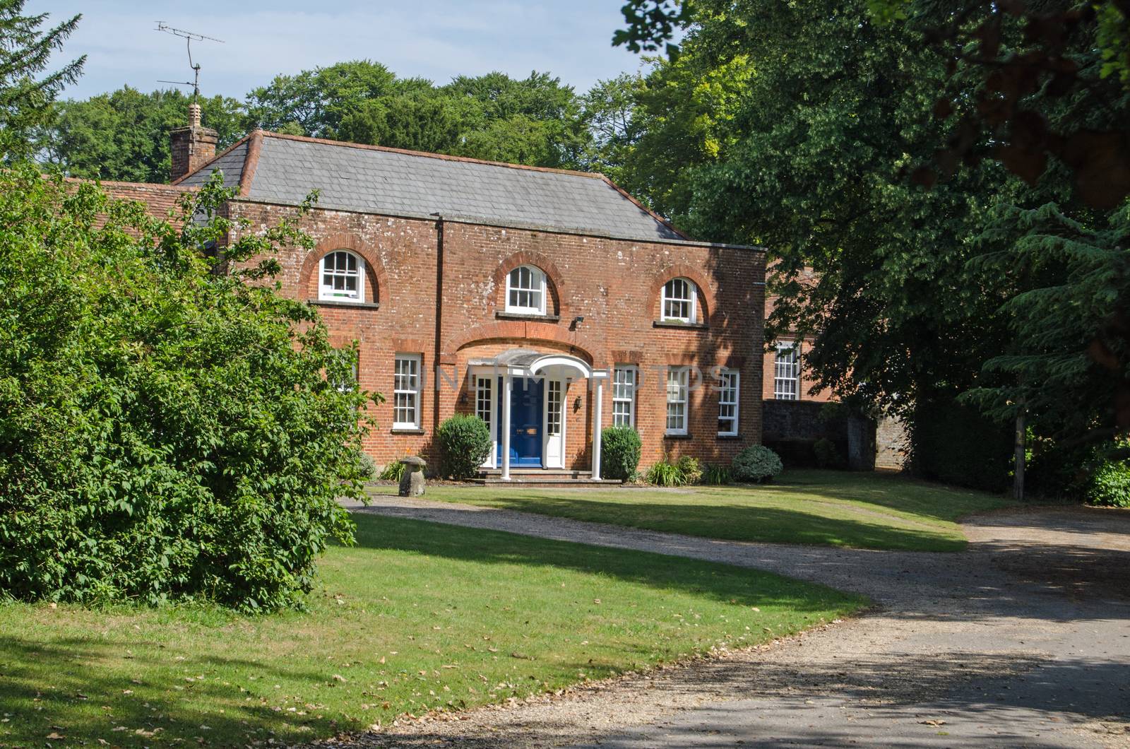 View of the historic former coach house built in Georgian times at Worting House in Basingstoke, Hampshire.  The novelist Jane Austen lived nearby and visited the stately home now turned into offices.