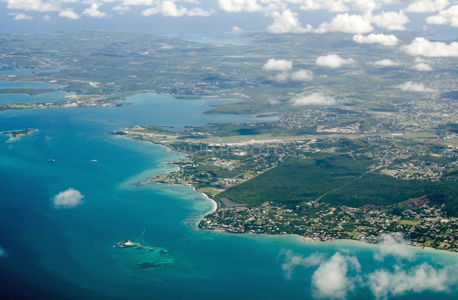 Aerial view of V.C. Bird International Airport, Cedar Grove, Osborn, Judge's Bay and Judge's Hill on the north coast of Antigua in the Caribbean.
