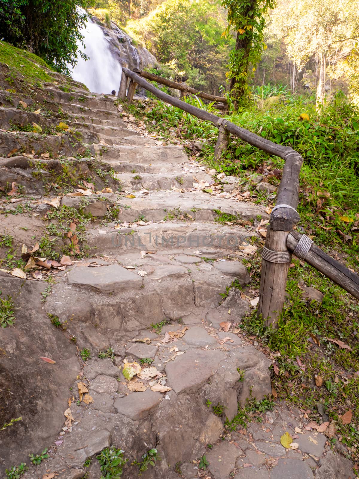 Old stone staircase, walkway steps on the mountain trail.