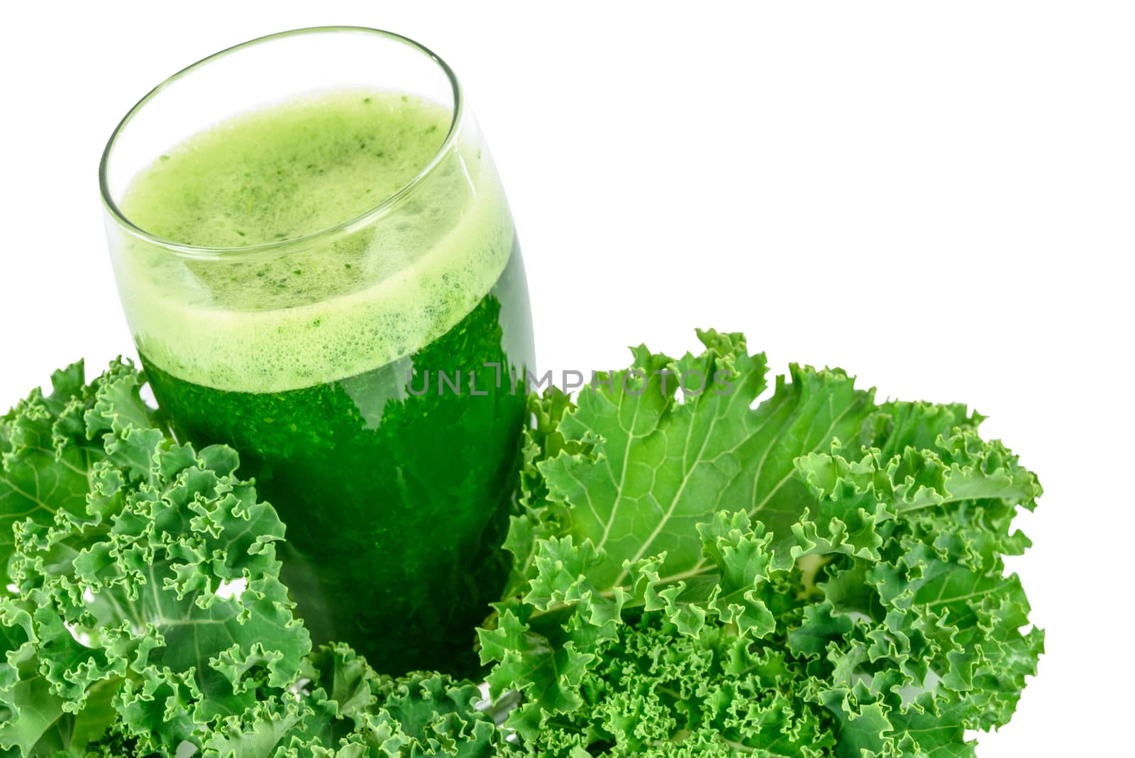 Healthy smoothie with green kale in glass isolated on white background