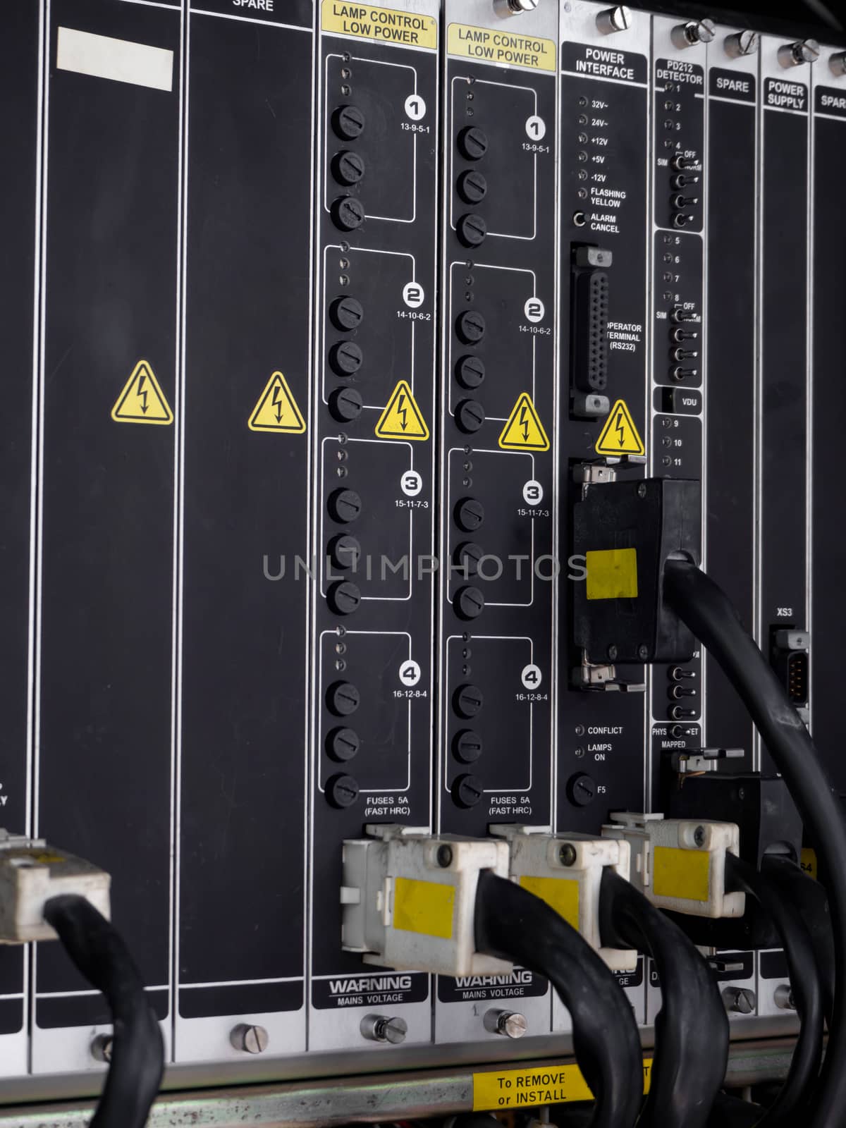 Electrical panel at a assembly line factory. Controls and switch by shutterbird