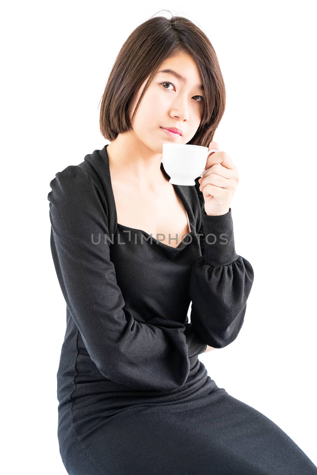 Woman holding coffee cup isolated on white  by stoonn