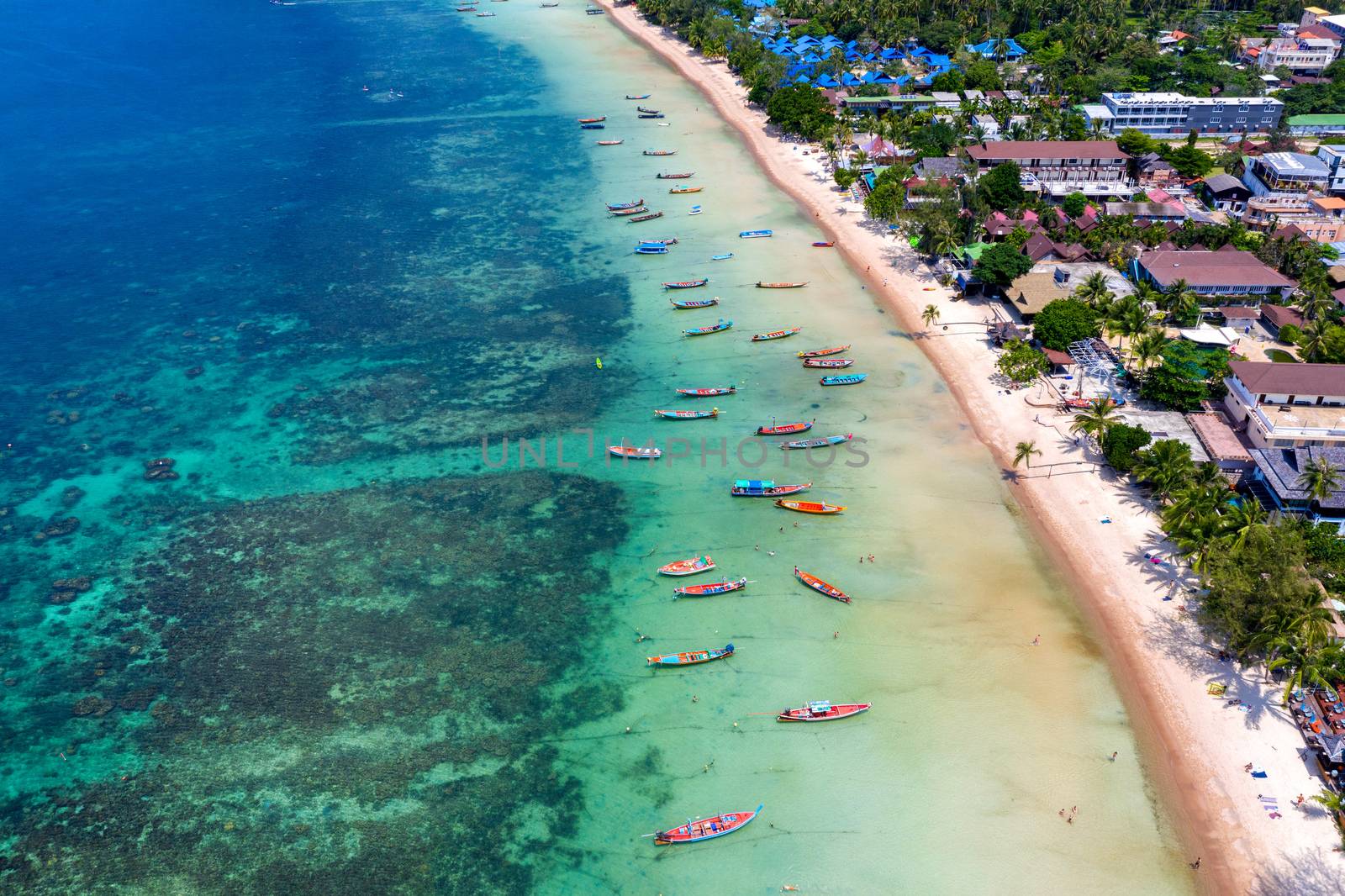 Aerial view of Long tail boats on the sea at Koh Tao island, Thailand. by gutarphotoghaphy