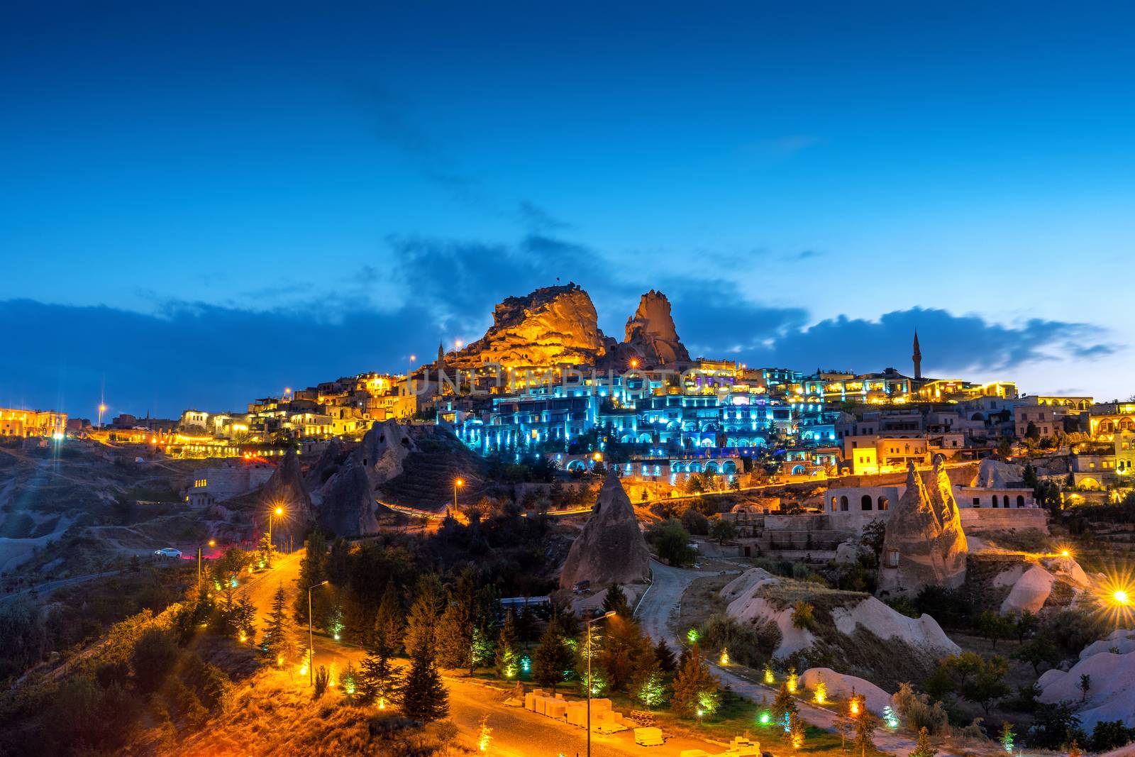 Uchisar Castle at night in Cappadocia, Turkey. by gutarphotoghaphy