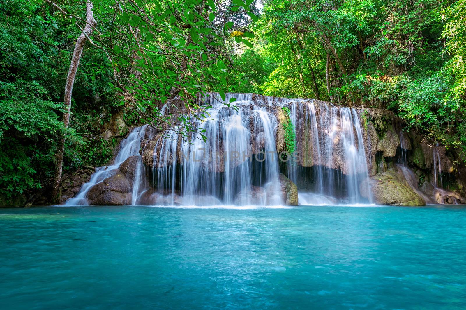 Erawan waterfall in Thailand. Beautiful waterfall with emerald pool in nature. by gutarphotoghaphy