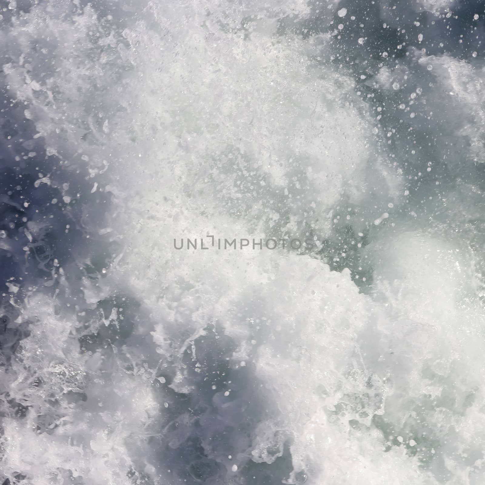 Sea wave foam texture. Marine aqua motion surface background. Outdoor water froth swirls backdrop.