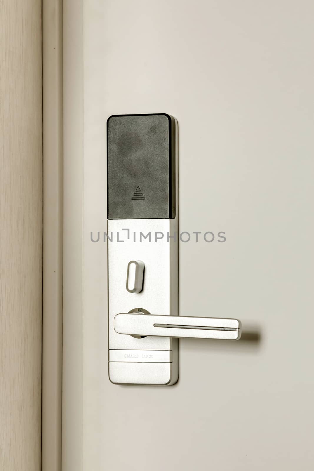 the front door with a door handle by sveter