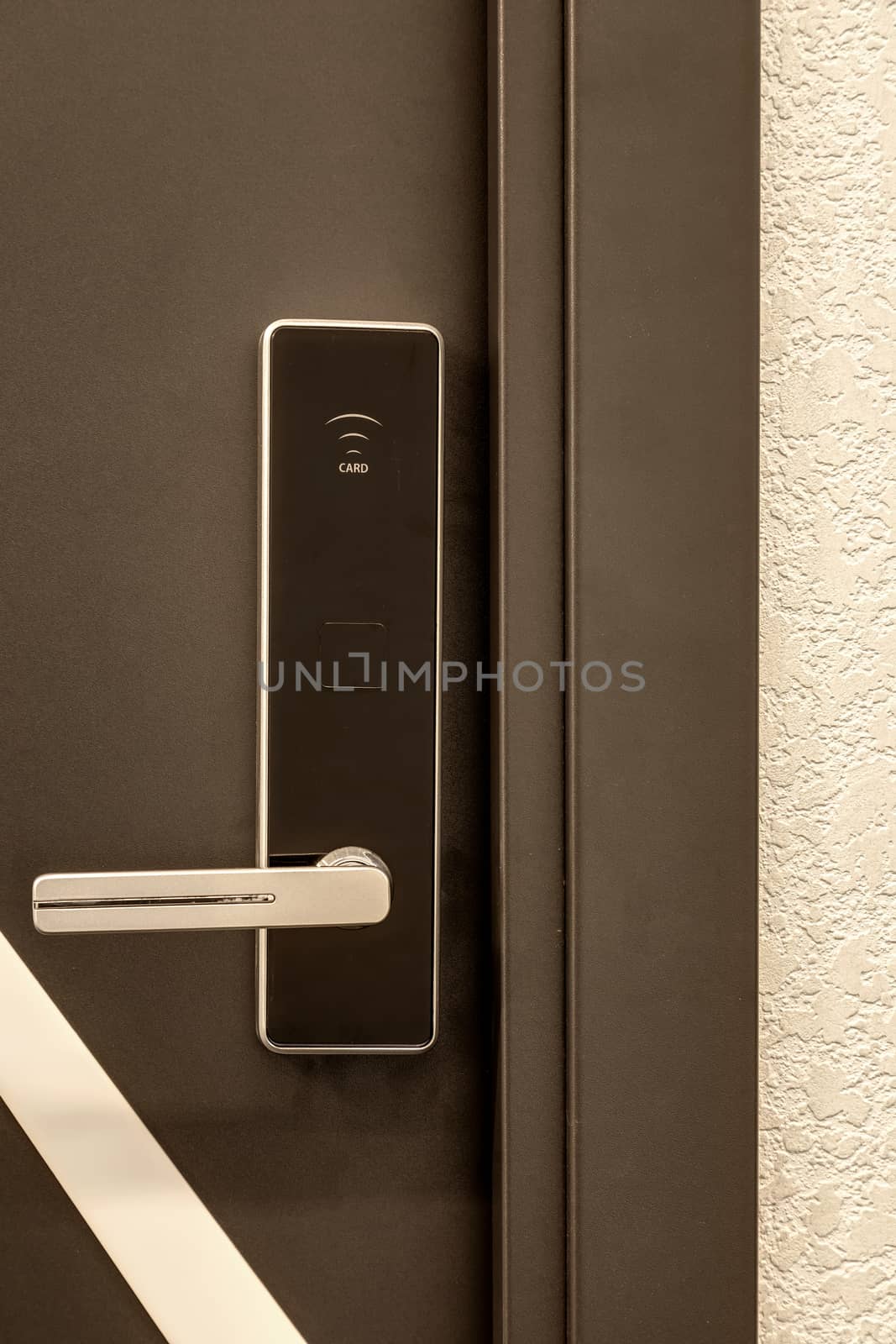 the front door with a door handle by sveter