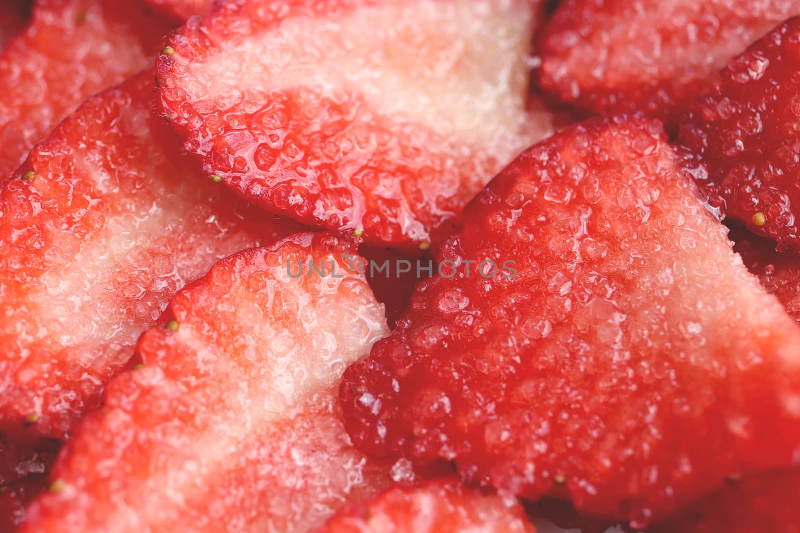 Red healthy tasty strawberry’s with sugar texture. Fresh vitamin berry backdrop. Sliced strawberry in sugar filling background. by sanches812