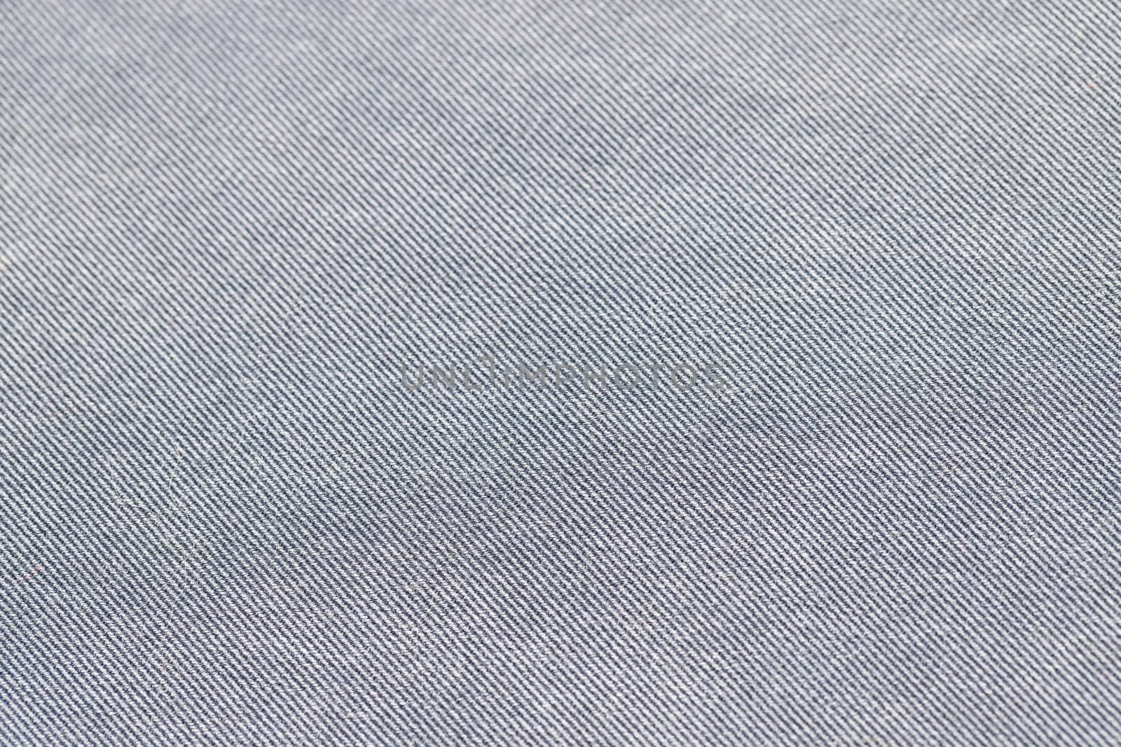 Close-up of blue denim texture. Denim jeans background by bonilook