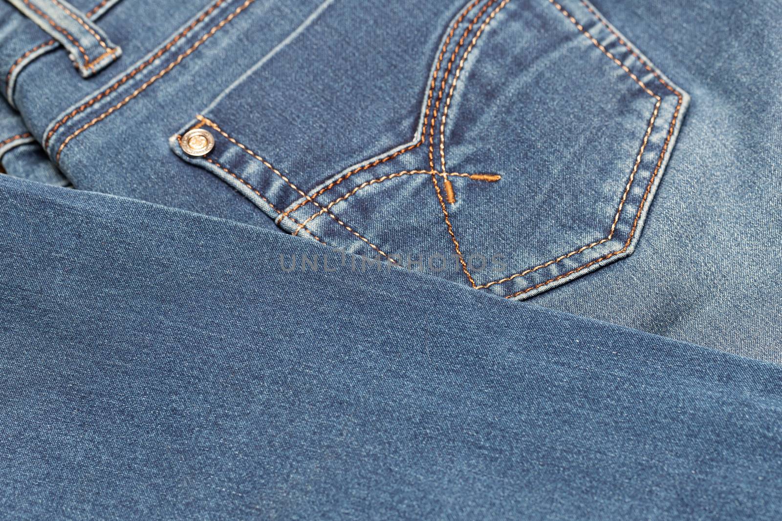 Close-up of blue denim texture. Denim jeans background by bonilook