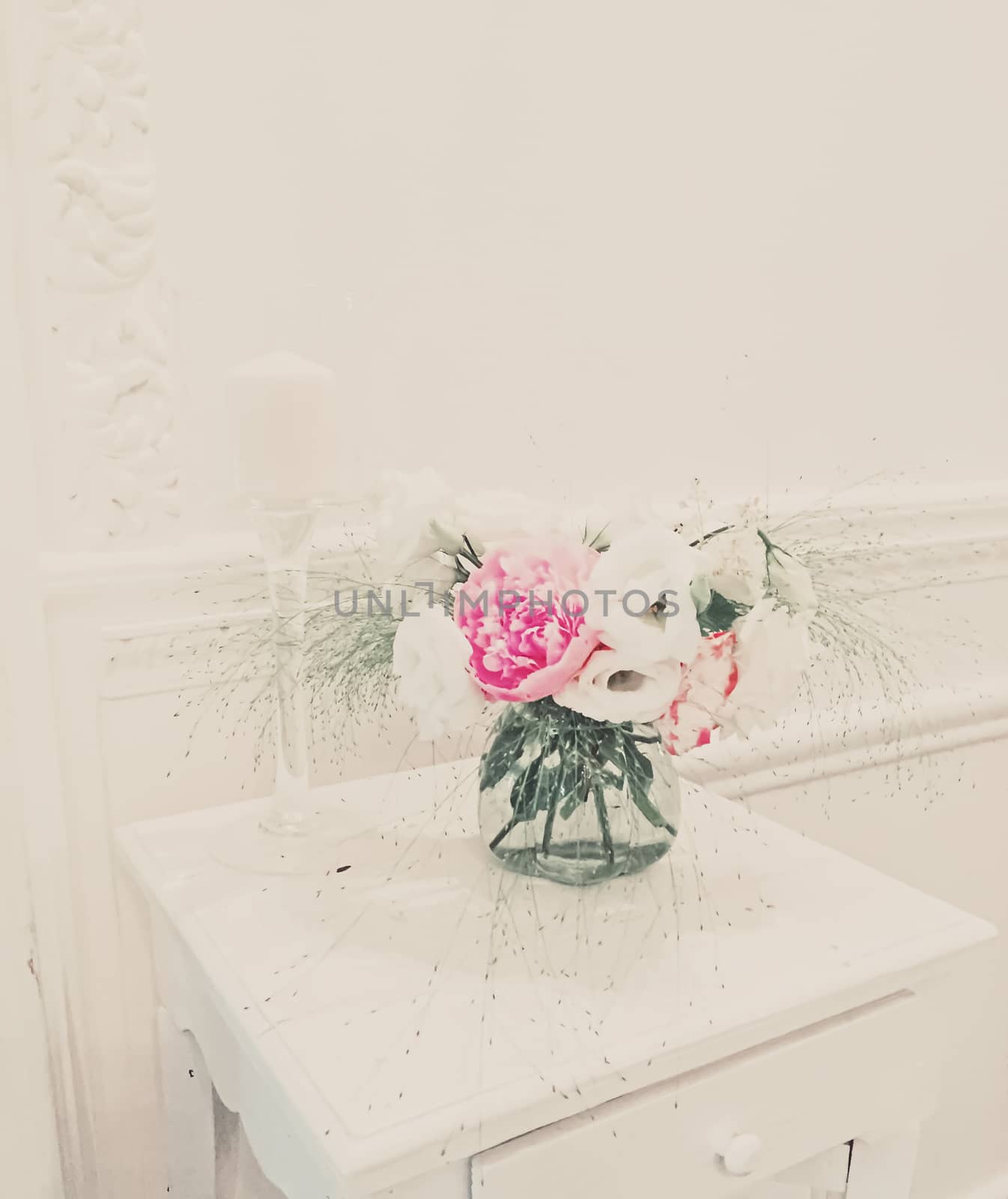 Bouquet of flowers in vase, chic interior design
