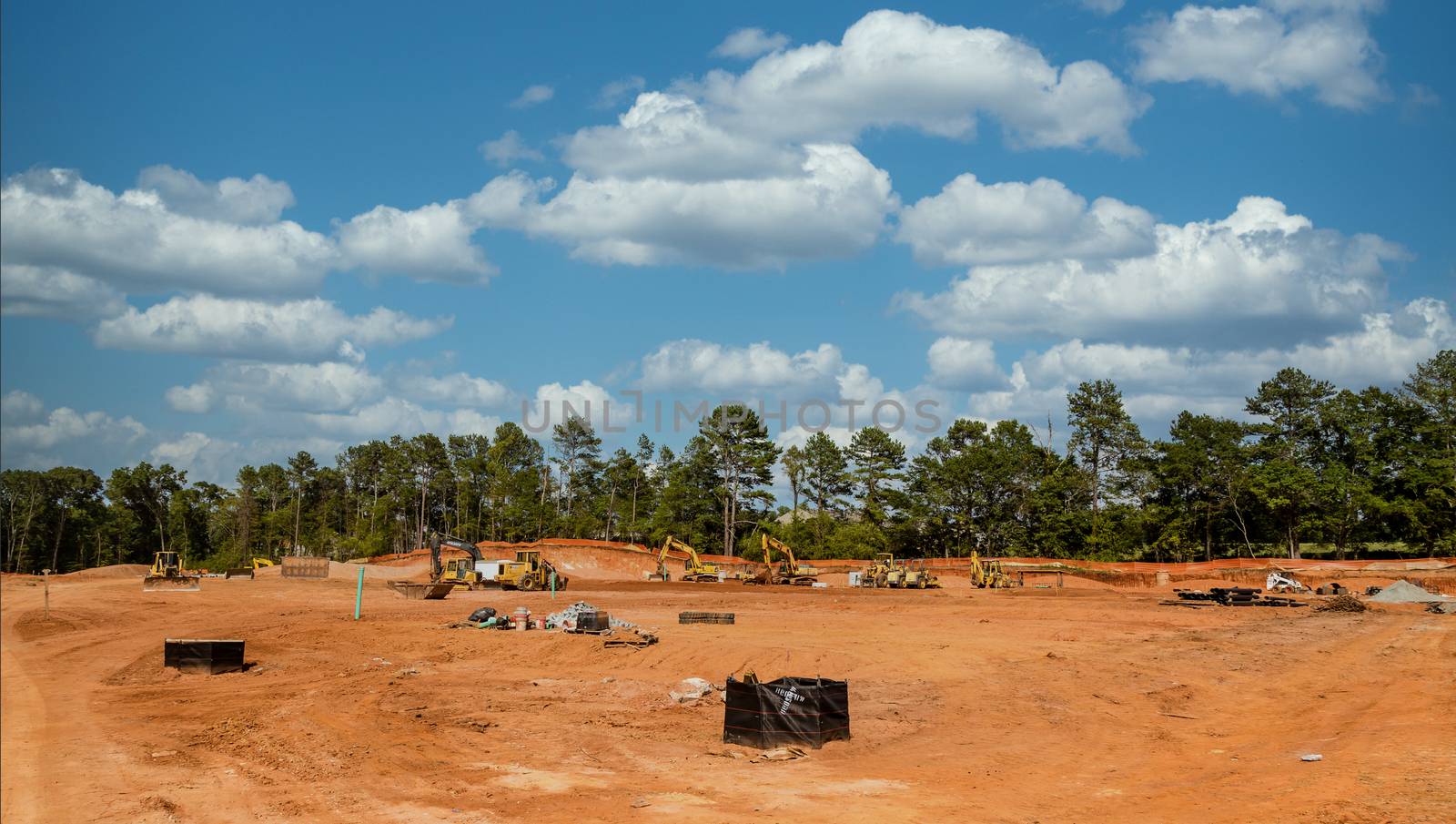 Residential Construction Site and Heavy Machinery by dbvirago