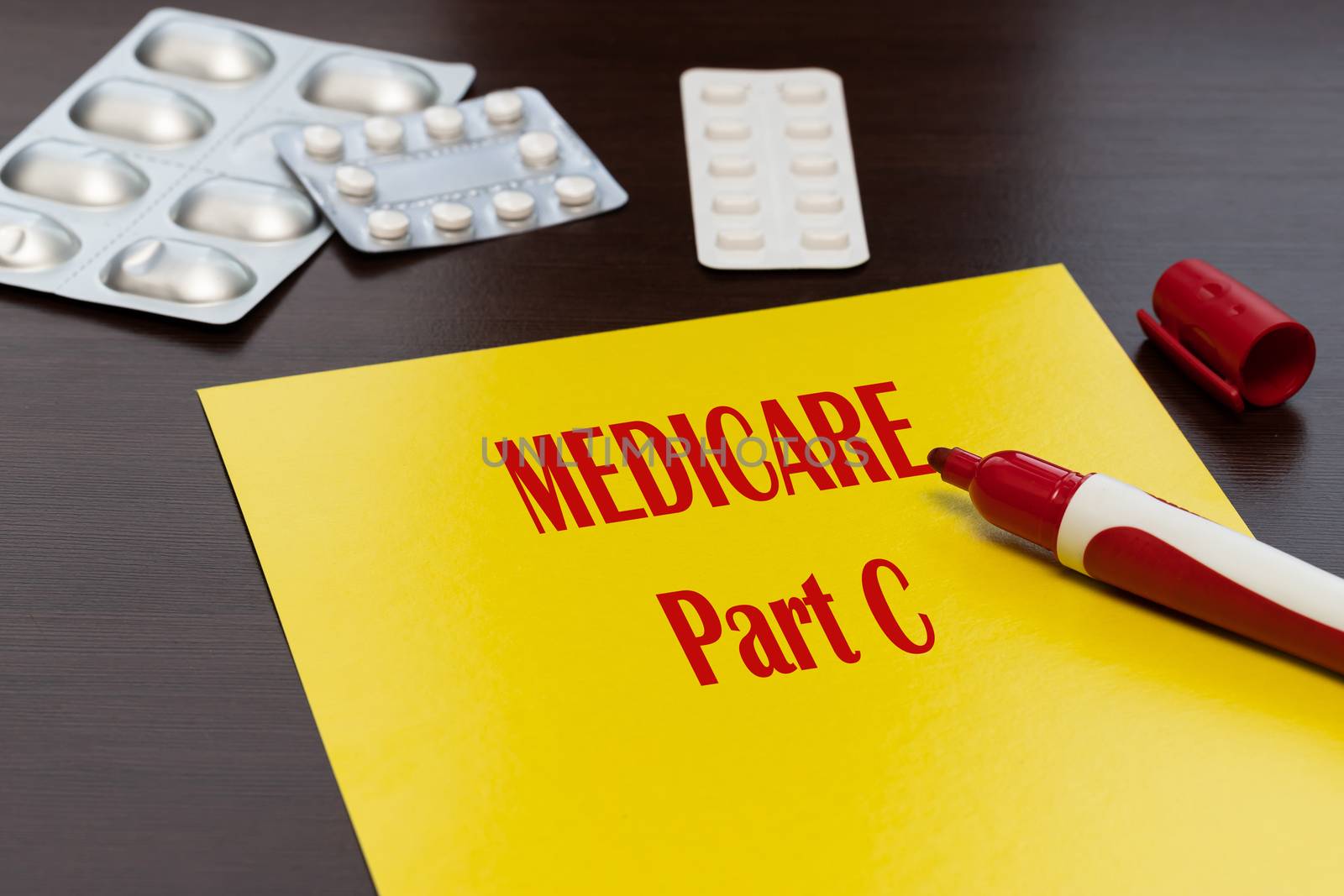 Medicare Part C, the text is written in red letters on a yellow sheet. An alternative way to get your Medicare benefits. by bonilook