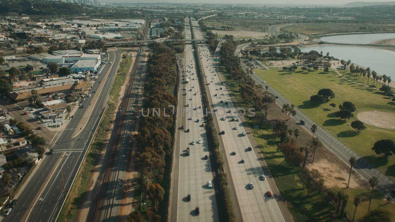 Aerial Flying over Freeway in California. Highway aerial View. by bhavik_jagani