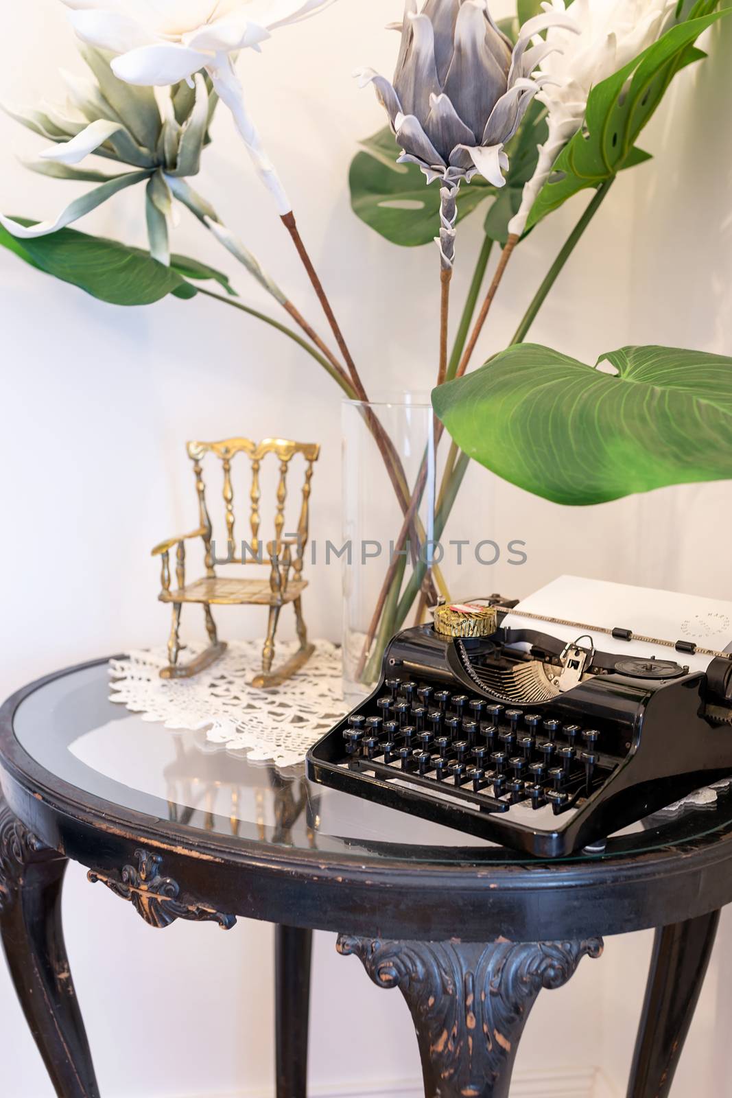 Still life - old vintage typewriter on an antique hardwood table. by tamas_gabor