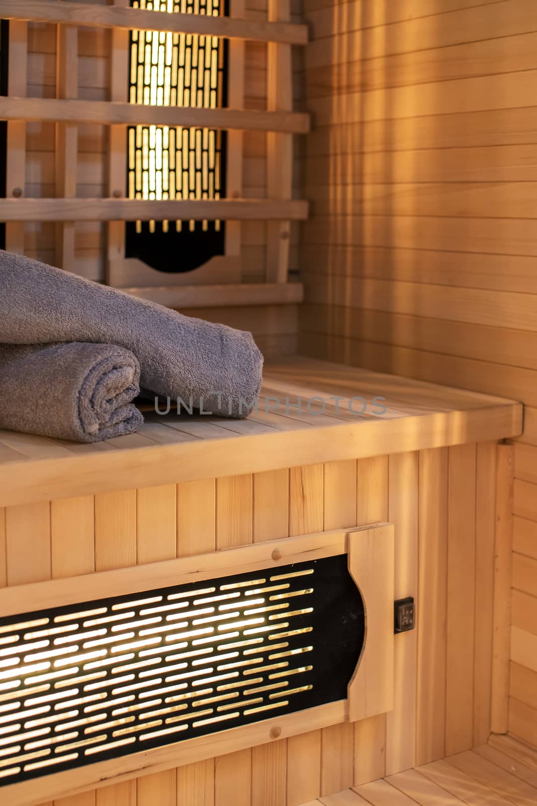 Home sauna with towels prepared in a vacation rental accommodation.