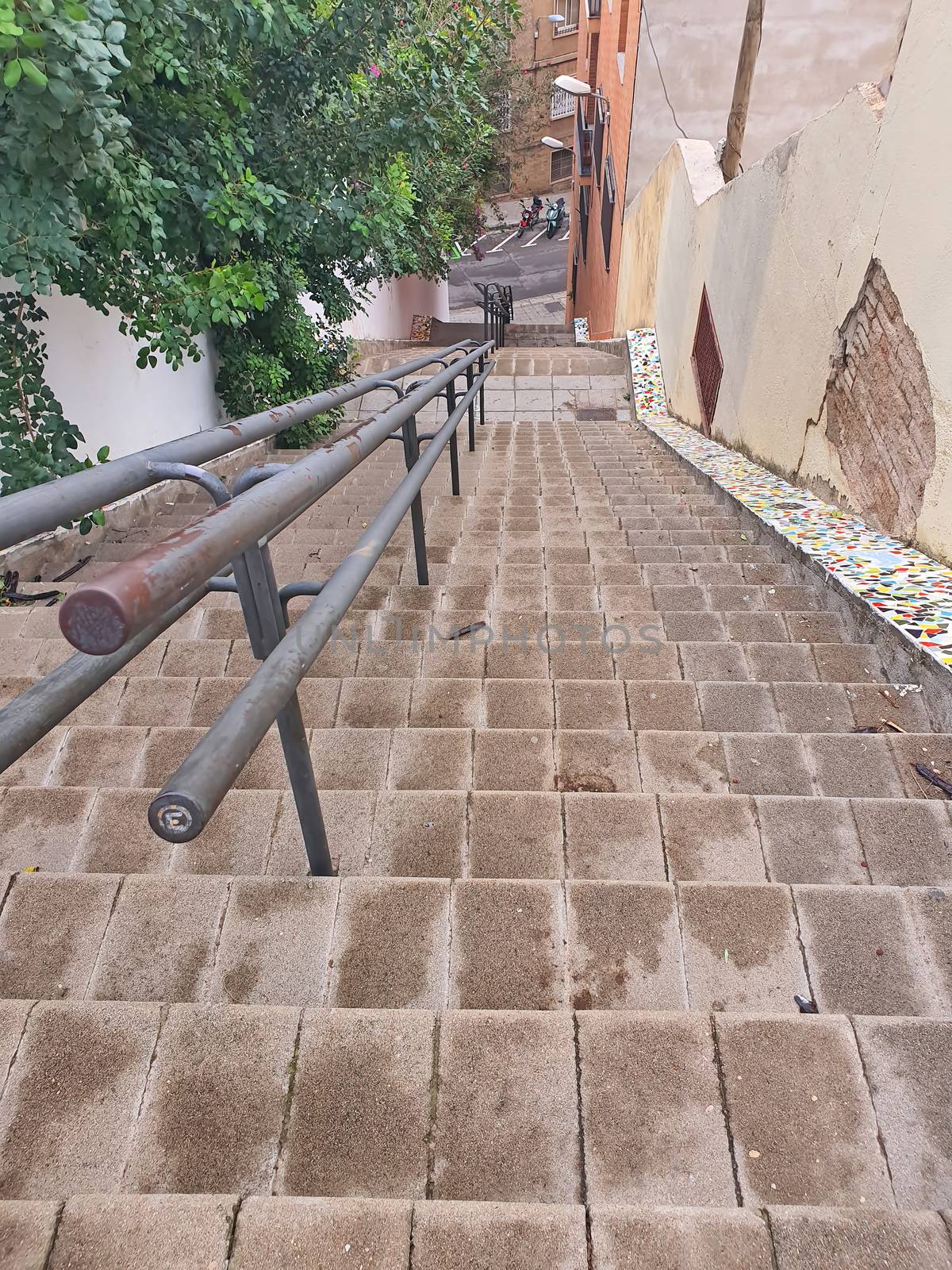 View along narrow stairs after rain in Barcelona