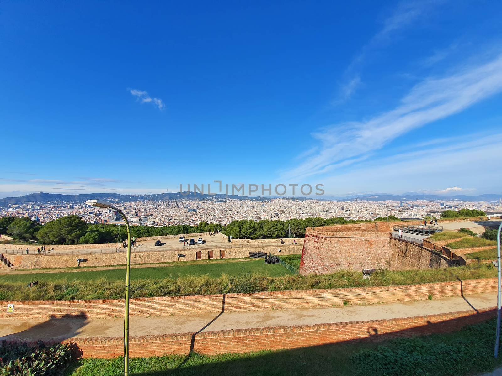 Ancient walls of Montjuic Castle and Barcelona panorama