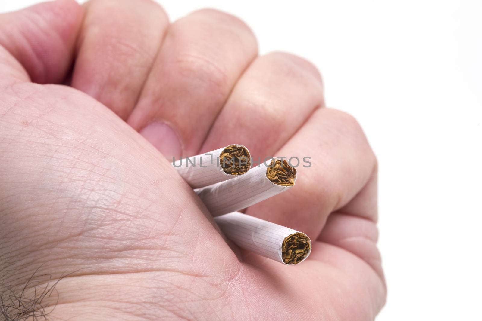 Man hand crushing cigarettes, No smoking campaign