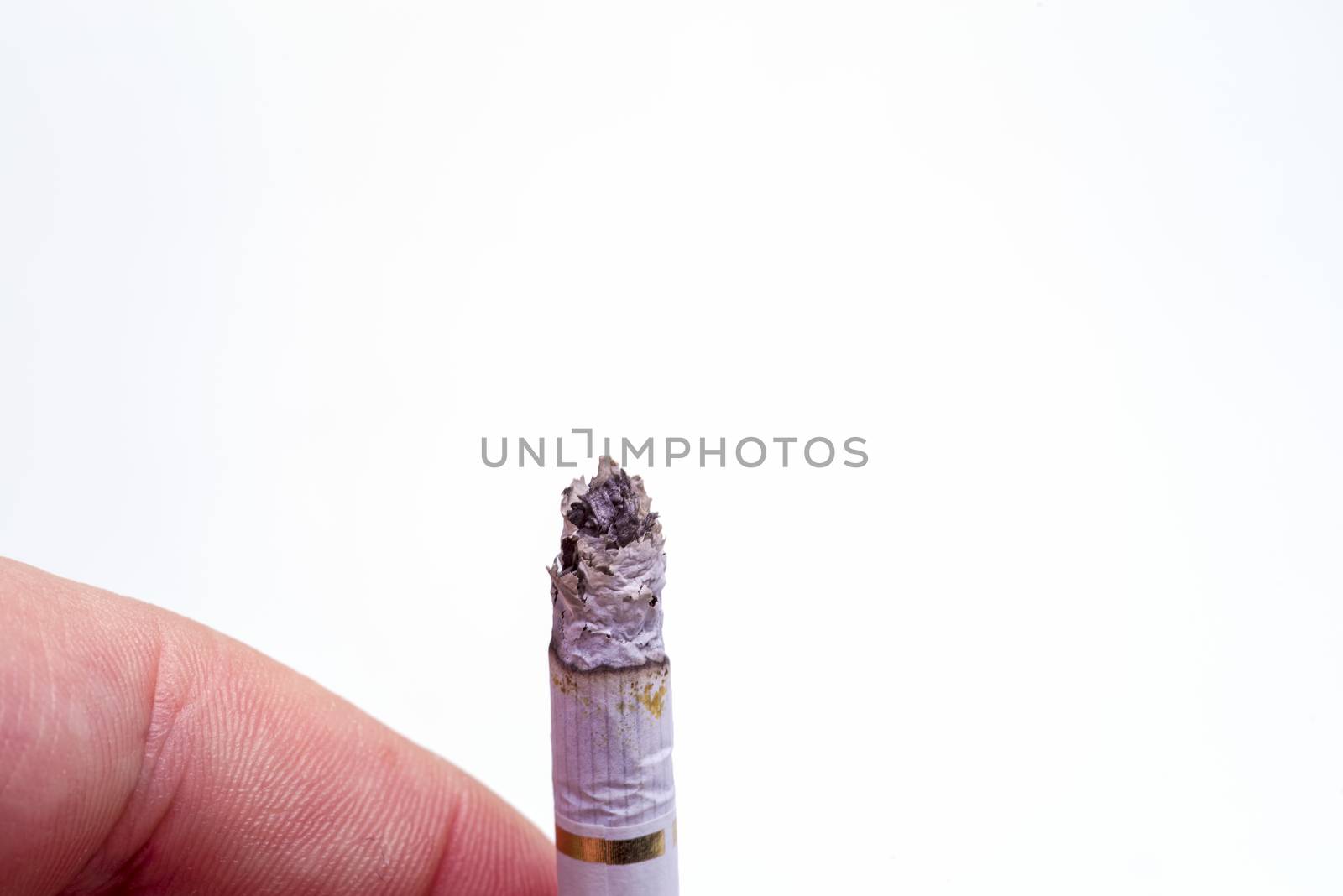 Burning cigarette isolated over white by savcoco