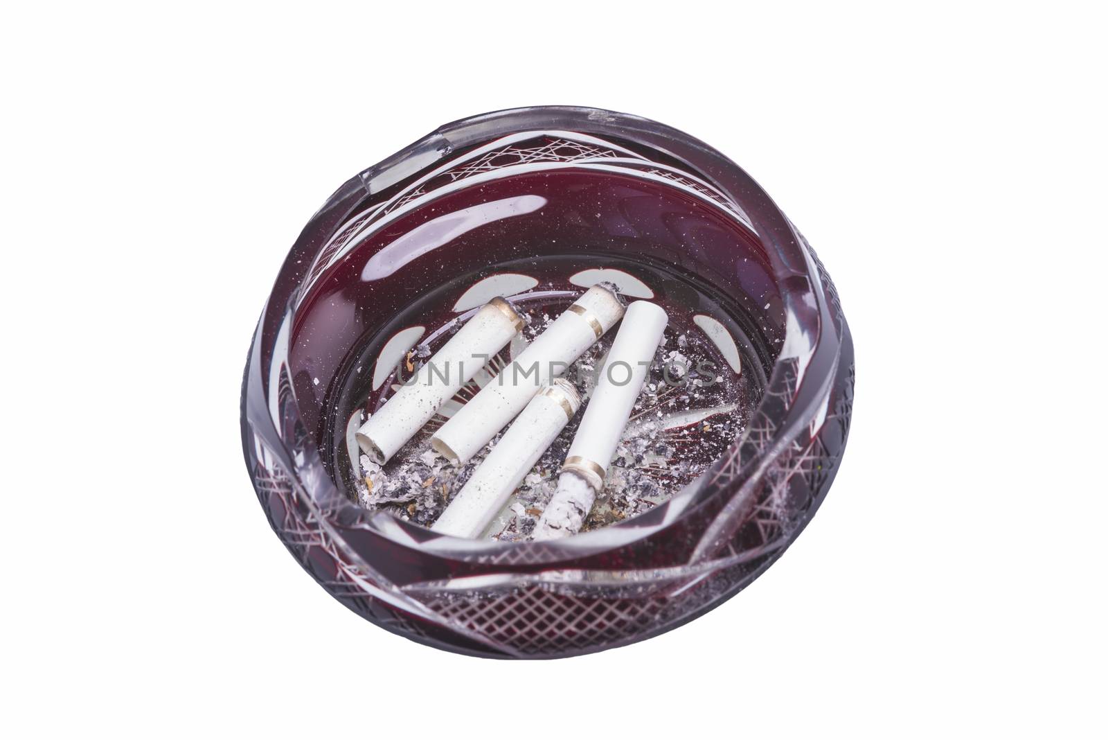 Cigarette butts in ashtray by savcoco
