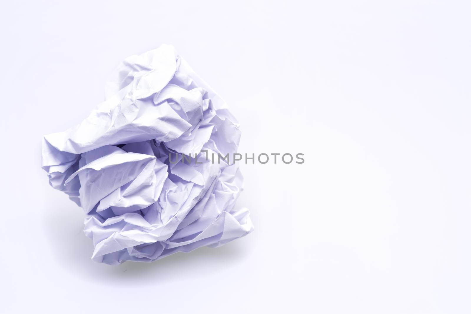 Close image of crumpled white paper ball, concept idea