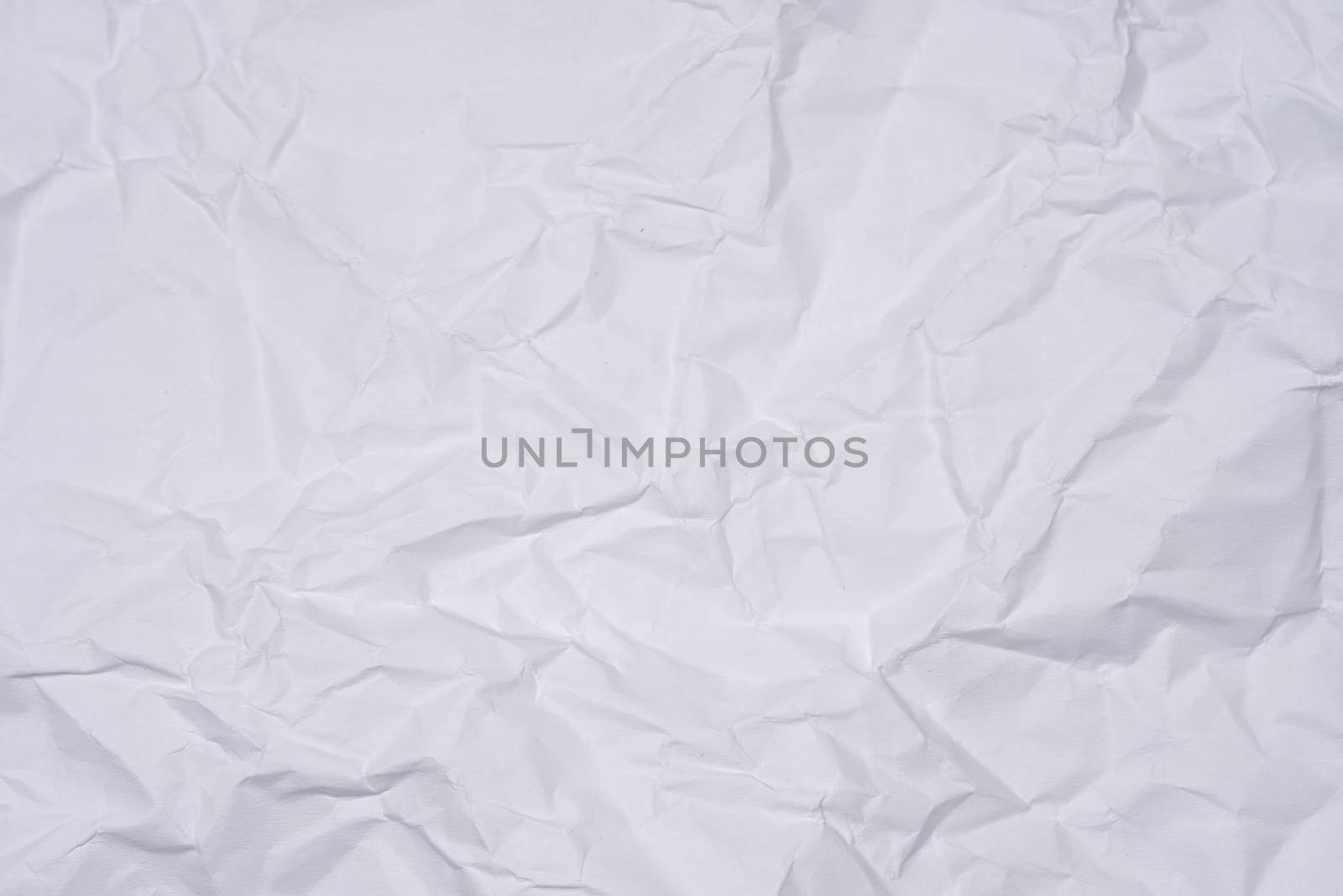 White crumpled paper as texture, close image