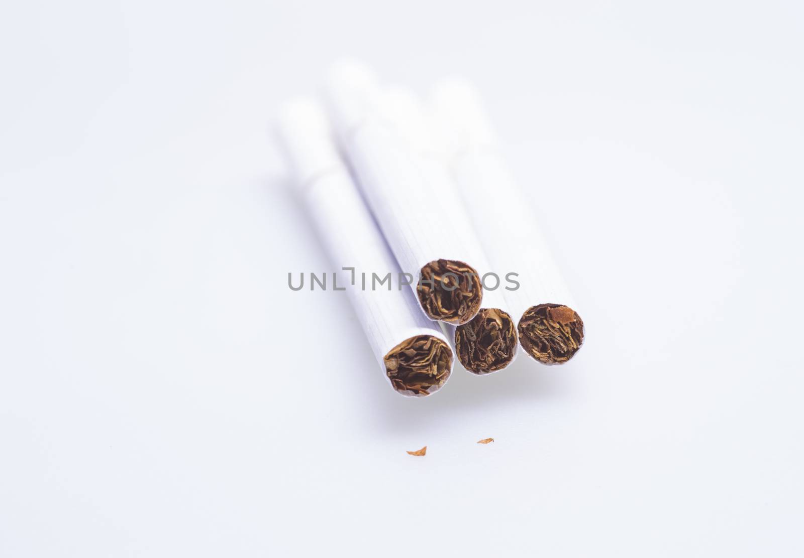 cigarettes on white background by savcoco