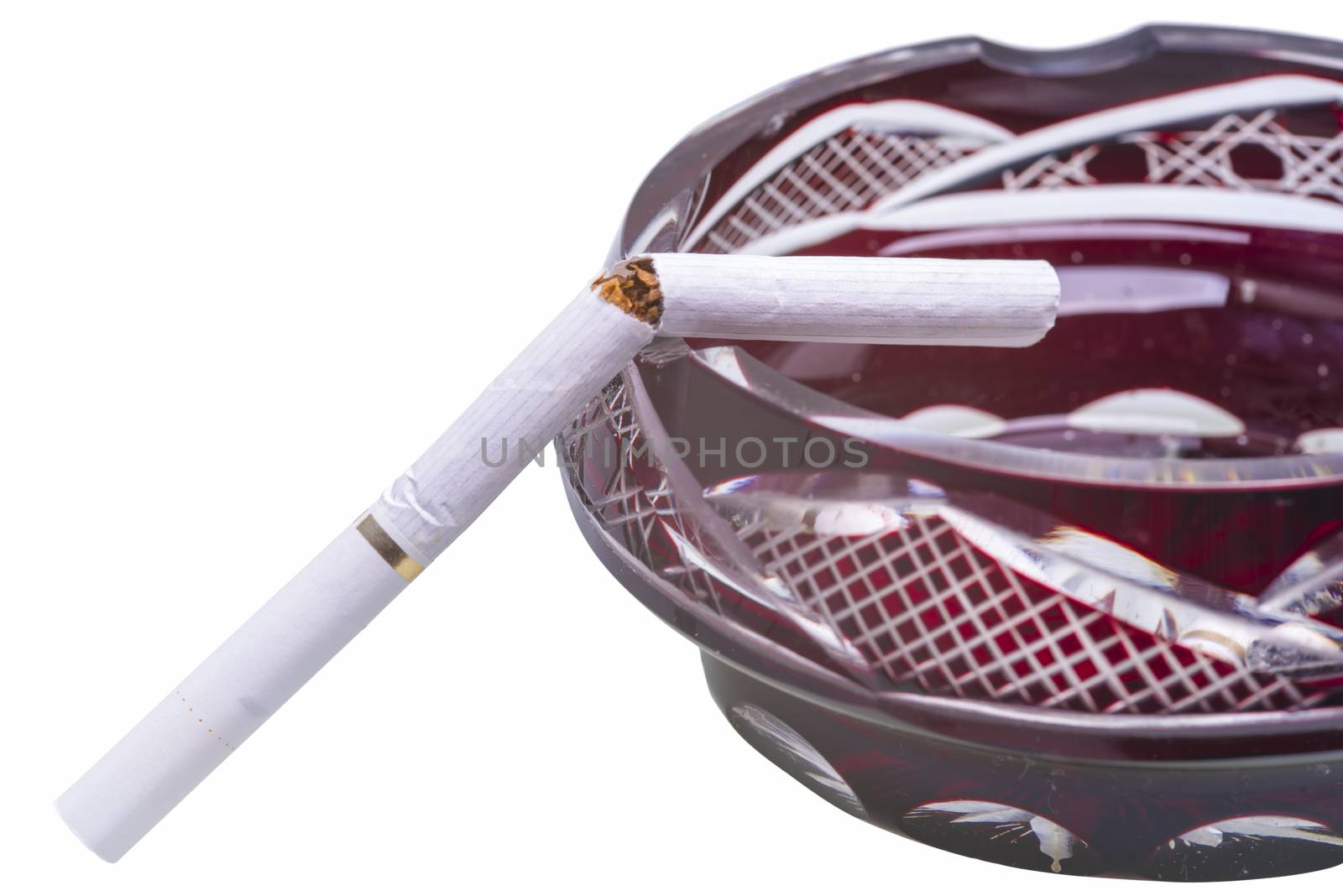 Close image of broken cigarette on ashtray