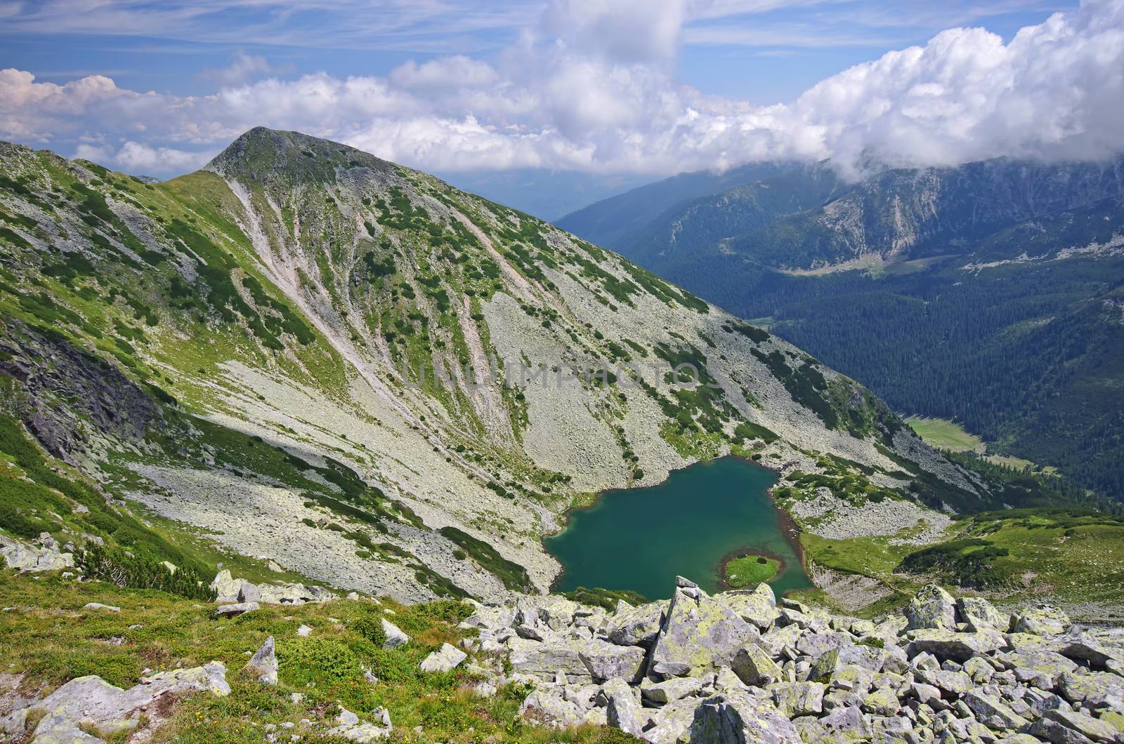 Alpine lake summer scene in Romanian Carpathians, Retezat mountains